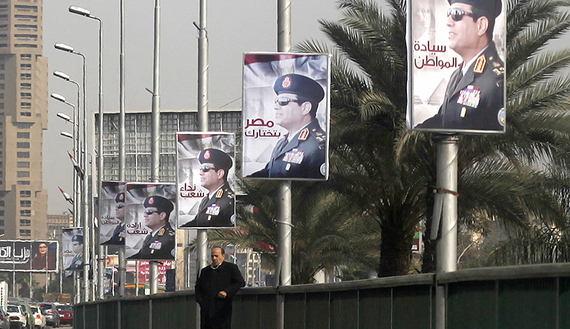  A bridge where huge posters of Egypt's army chief Field Marshal Abdel Fattah al-Sisi are hanged in center Cairo